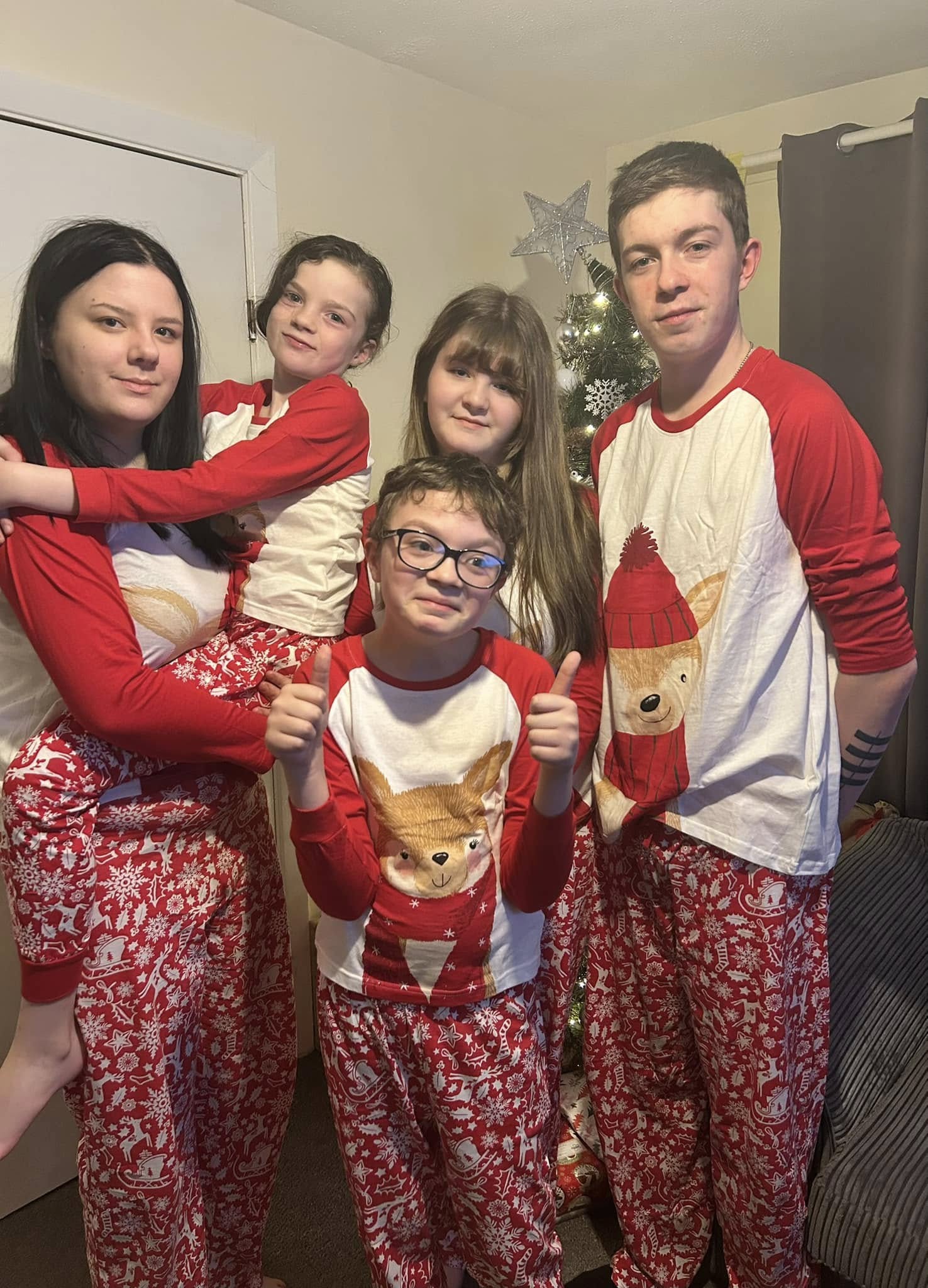 Let's Catch up Pcture of 5 children in christmas pyjamas